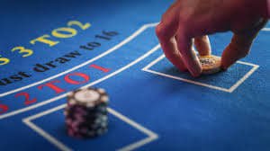 Filipino player using ph 20 on a mobile phone for sports betting and casino games